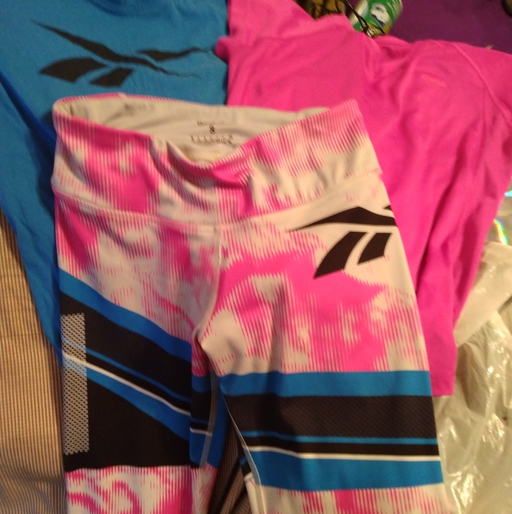 Leggings with 2 shirts that match. Sizes women's small
